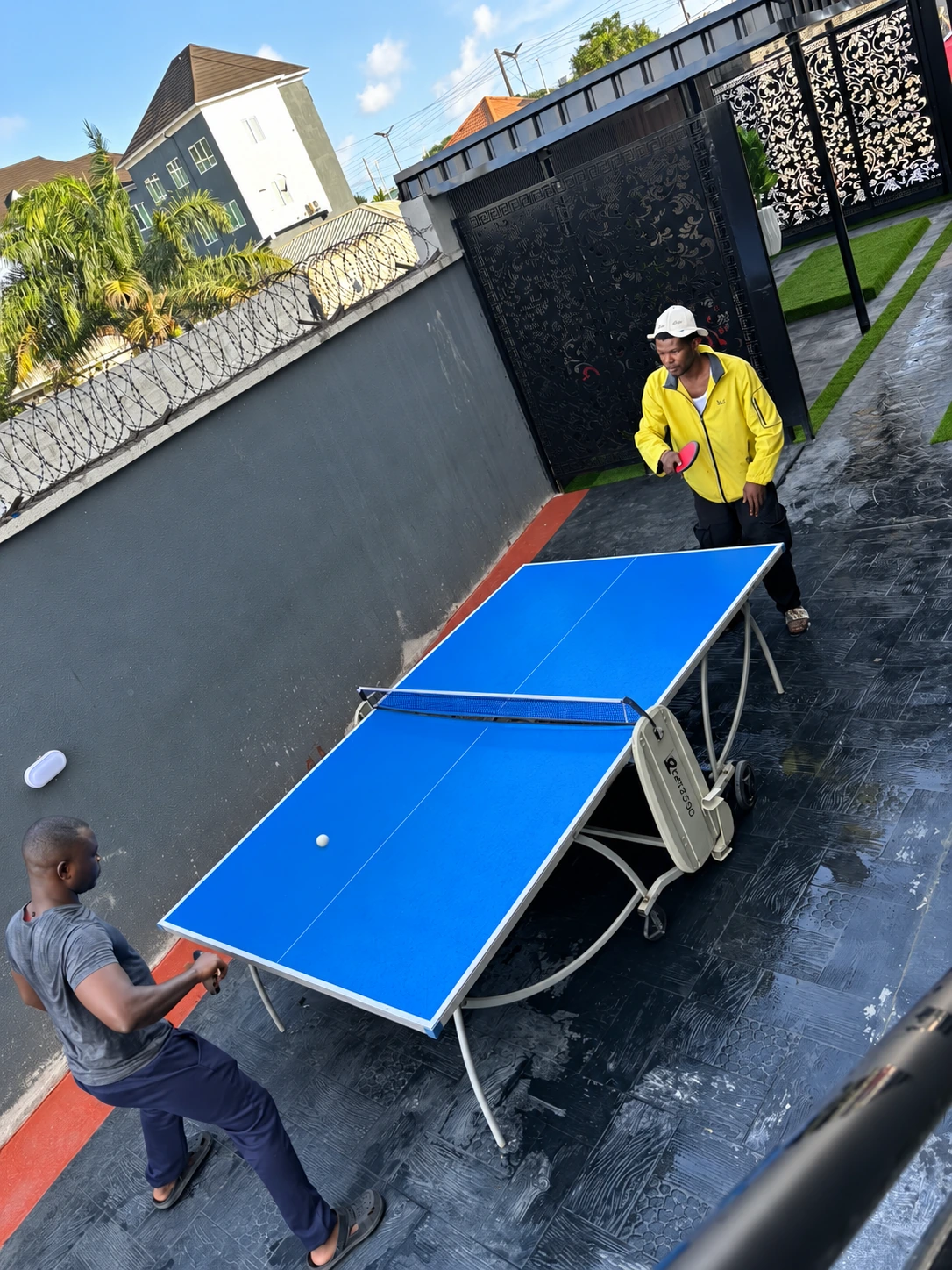 Members playing table tennis at Fitness Arcade